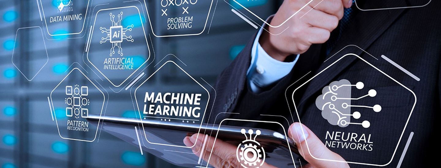Image showing the torso of a man in a suit, with white graphics related to computer science topics laid over the image