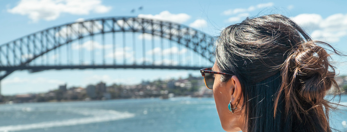 Female student looking sydney harbour