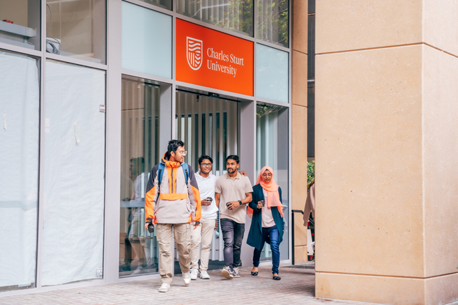 Male female student walking