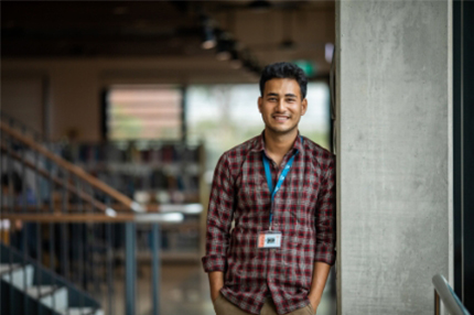 Male student happy on campus