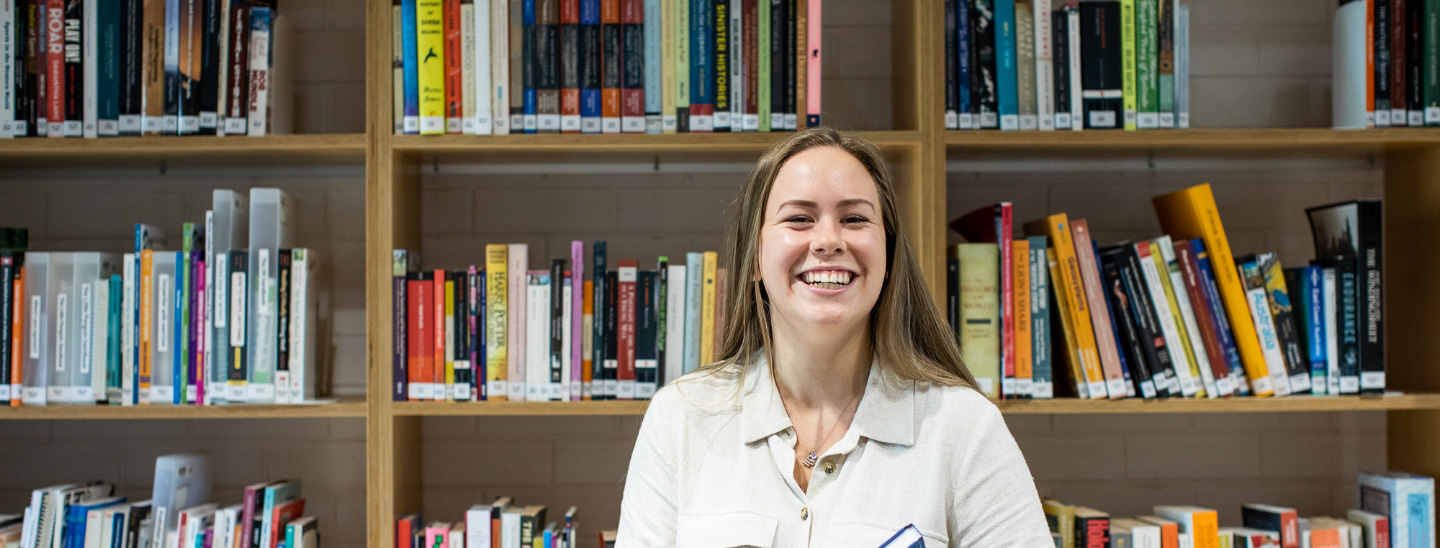 Student in library happy