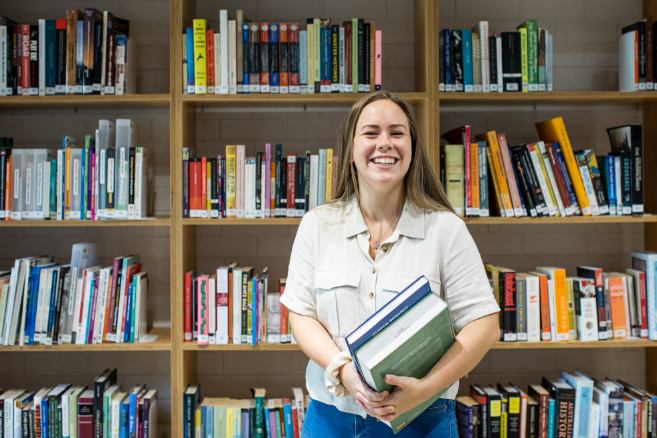 Student in library happy