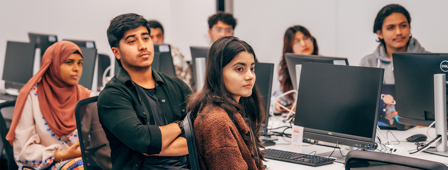 Students at computer desk