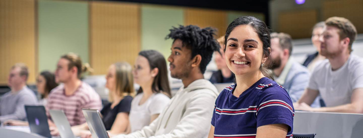 Students on campus in lecture hall