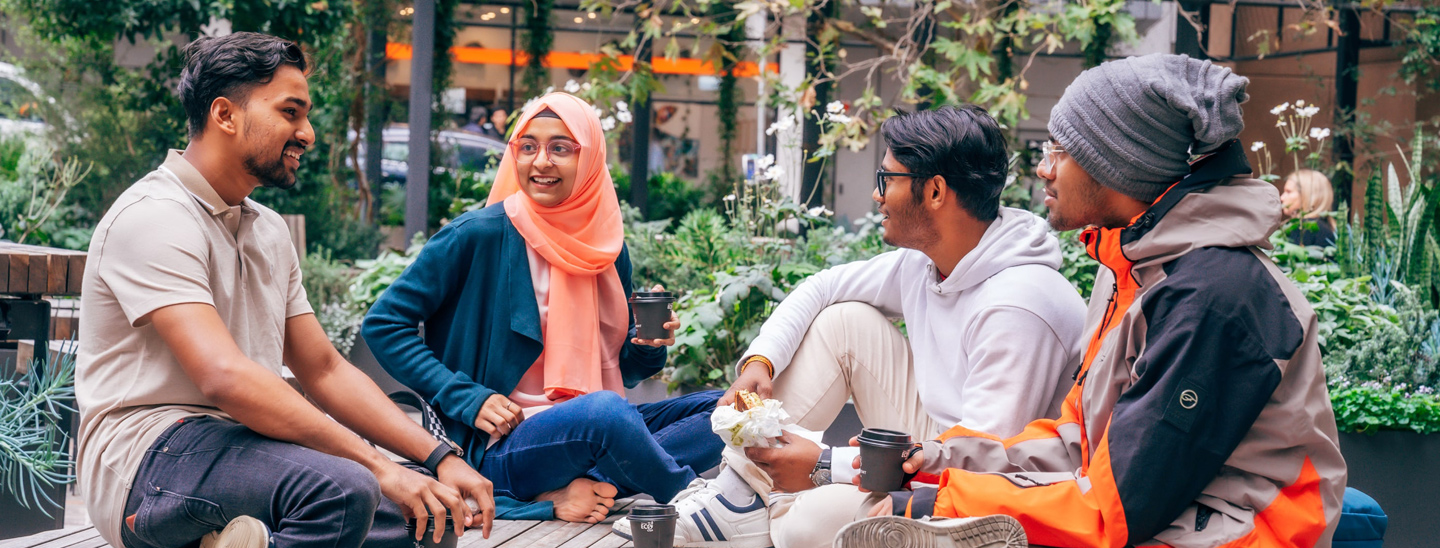 Students sitting outside sydney campus