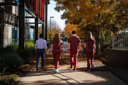 Students walking outside medical