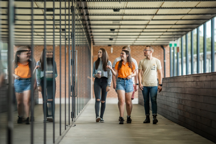 Students walking outside on campus