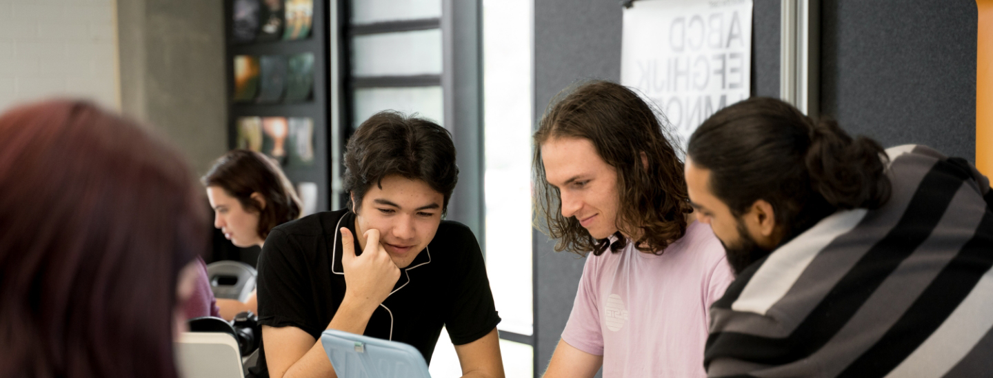 Students working together computers