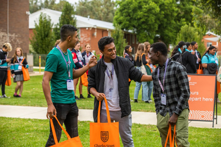 Three students at explore day